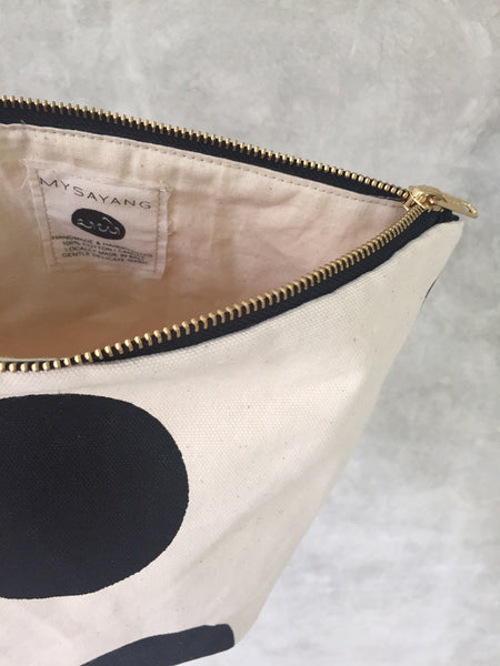 handprinted canvas with polka dots 
